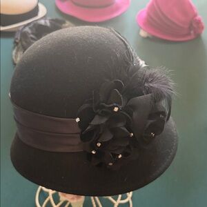 Elegant Black Cloche Hat with Floral Accent